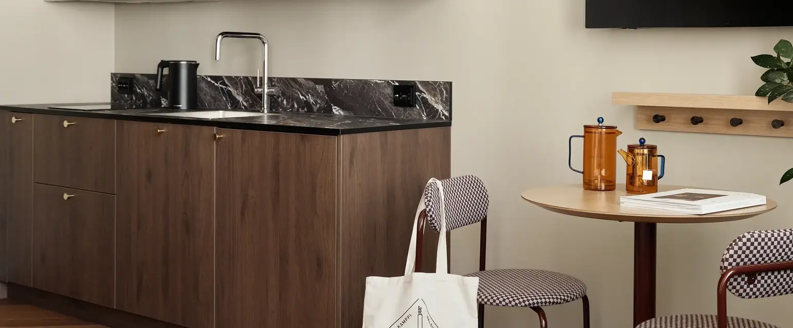 a kitchen with a table and a countertop