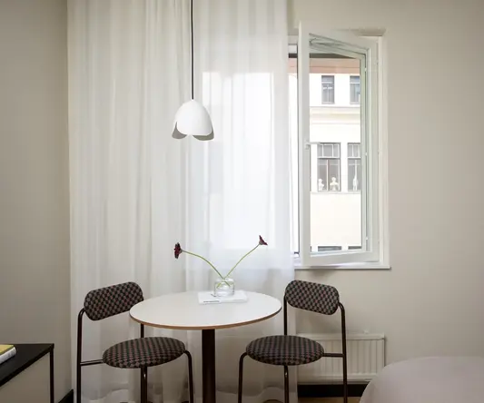 a table and chairs in a room