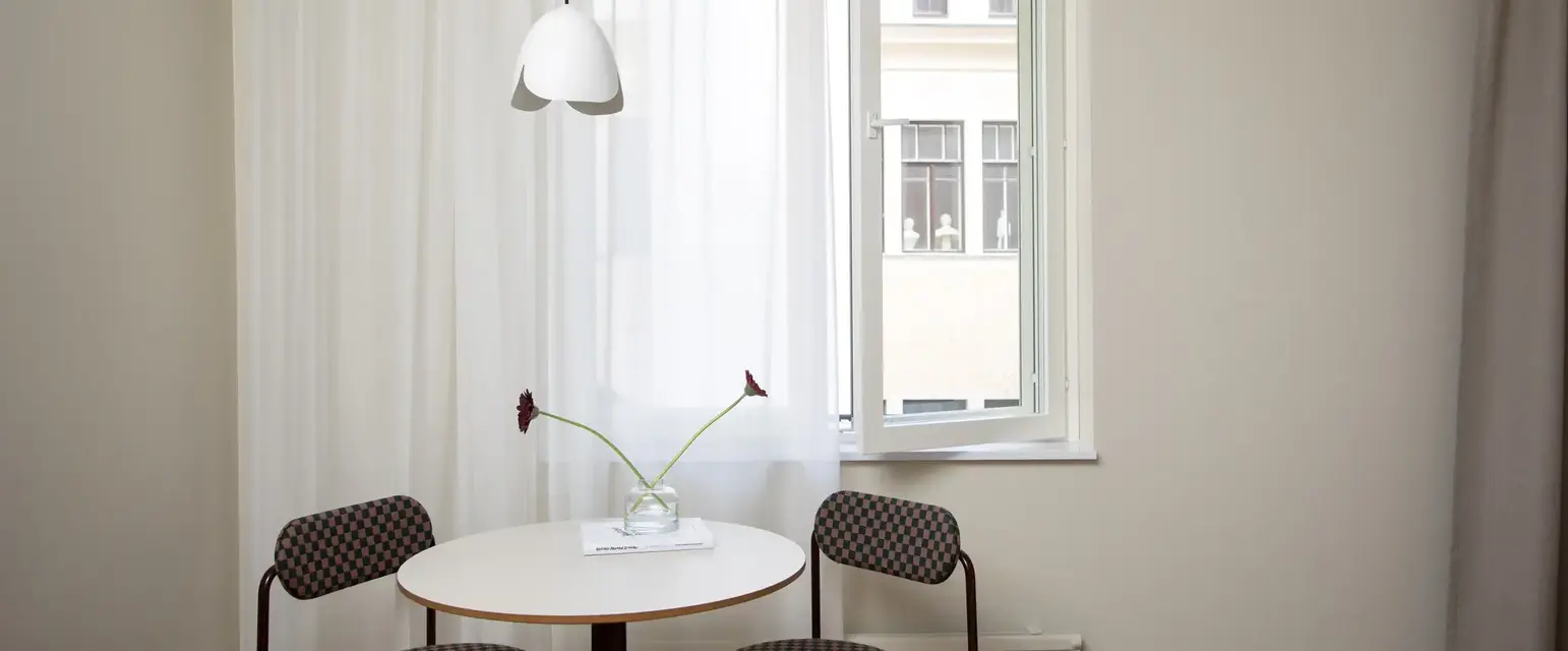 a table and chairs in a room