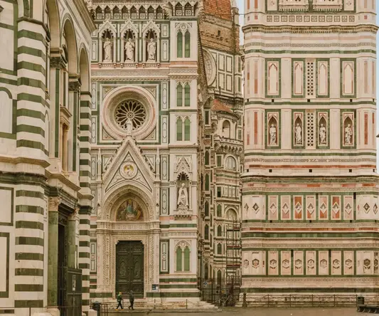 a large building with a dome and a tower