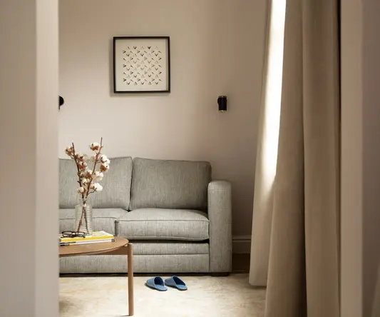 a living room with a couch and a coffee table