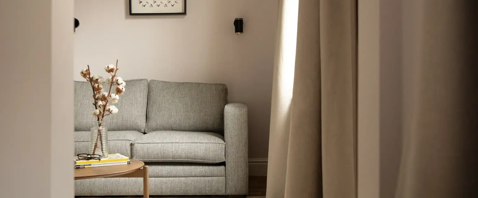 a living room with a couch and a coffee table
