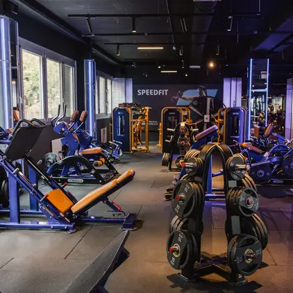 a large room with gym equipment