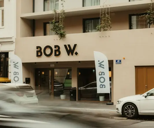 a building with cars parked in front of it