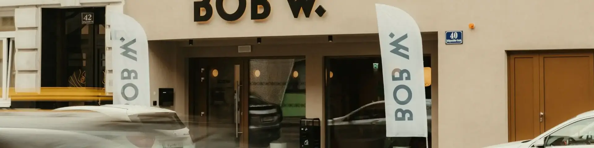 a building with cars parked in front of it