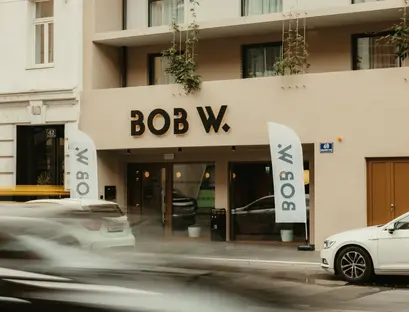 a building with cars parked in front of it