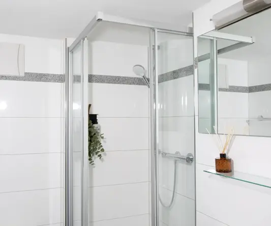 a shower with a glass door