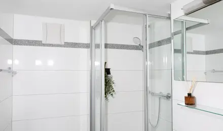 a shower with a glass door