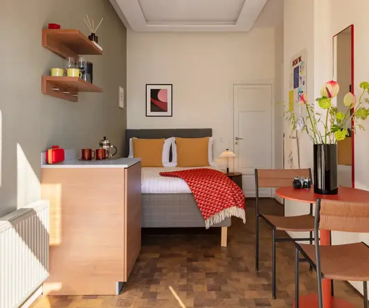 a room with a bed and a table