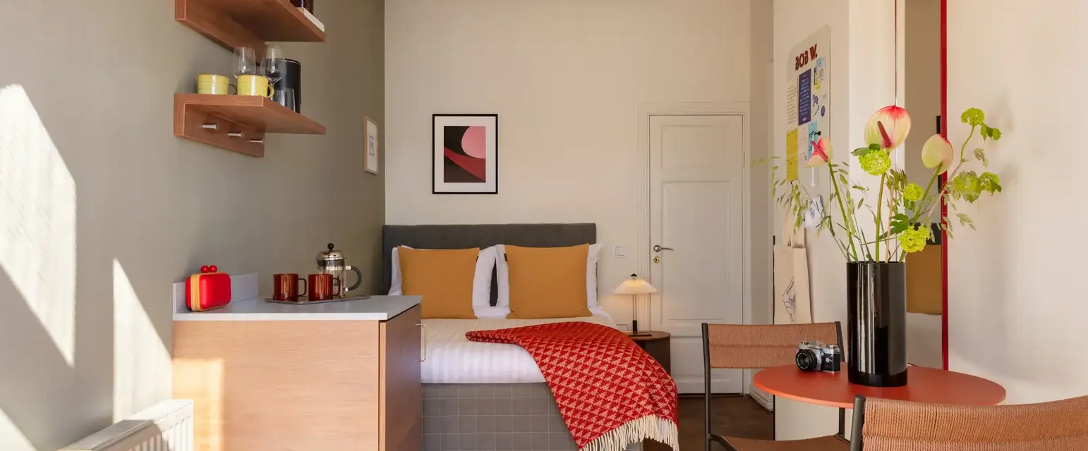 a room with a bed and a table