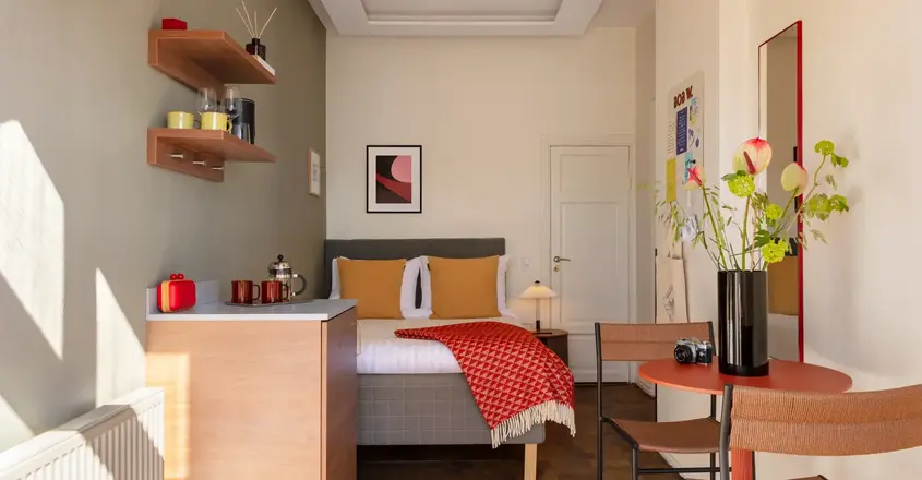 a room with a bed and a table