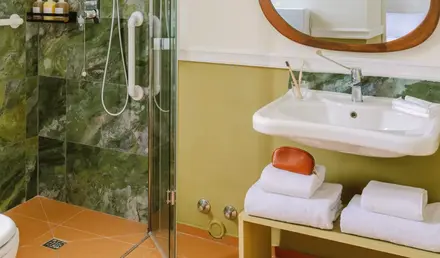 a bathroom with a mirror and sink