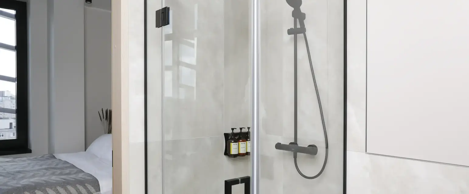 a shower with a glass door