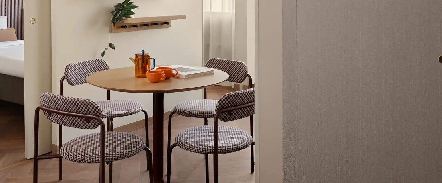 a table and chairs in a room