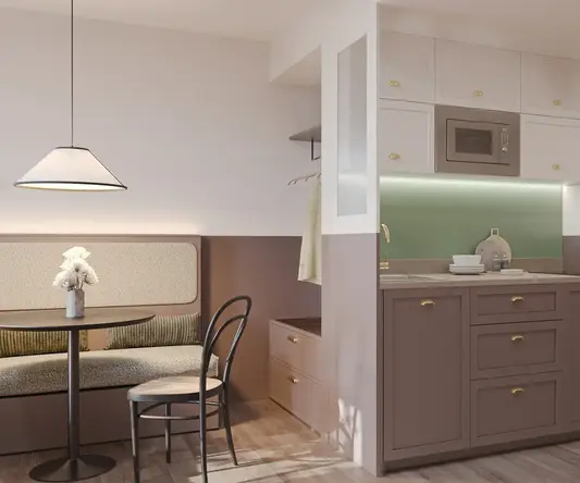 a kitchen with a chair and a table