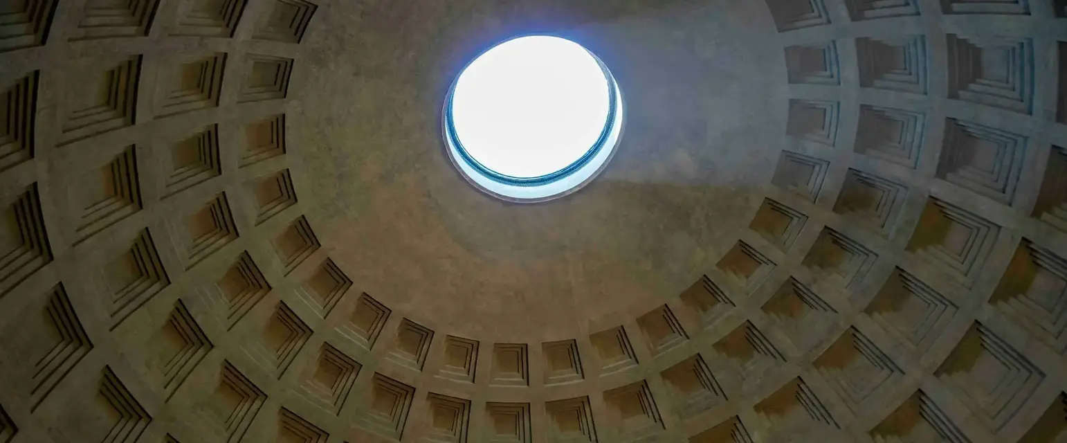 a circular ceiling with a light in the middle