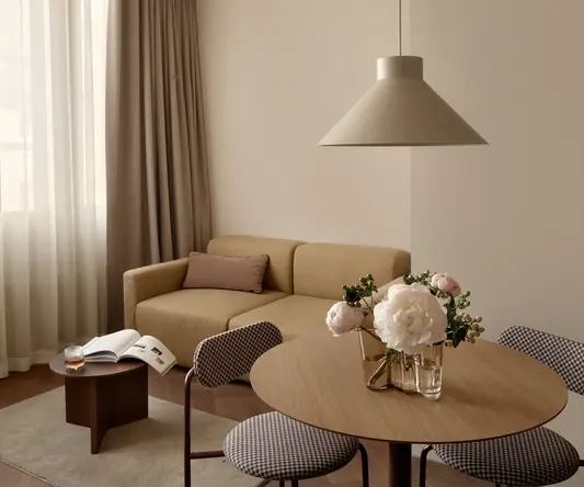 a living room with a couch and a table