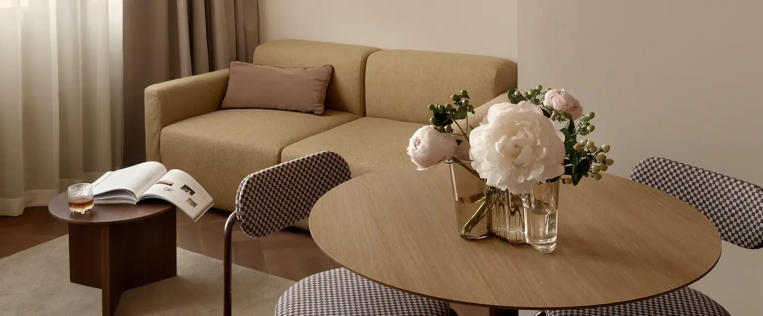 a living room with a couch and a table