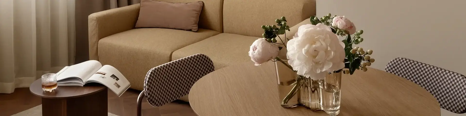 a living room with a couch and a table