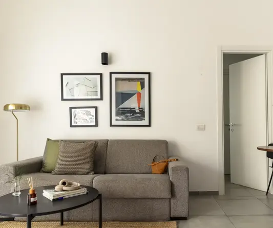 a living room with a couch and a coffee table