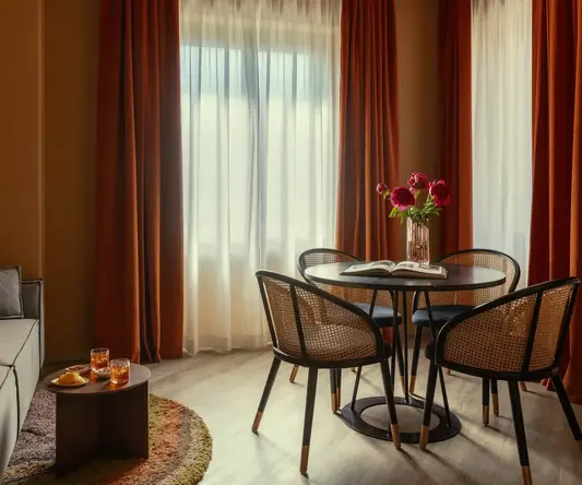 a room with a table and chairs