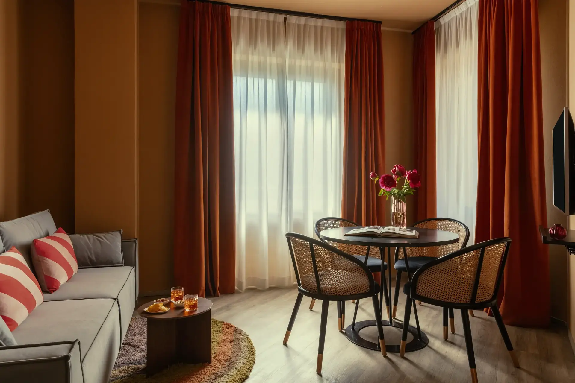 a room with a table and chairs