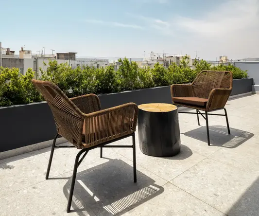 a group of chairs on a patio