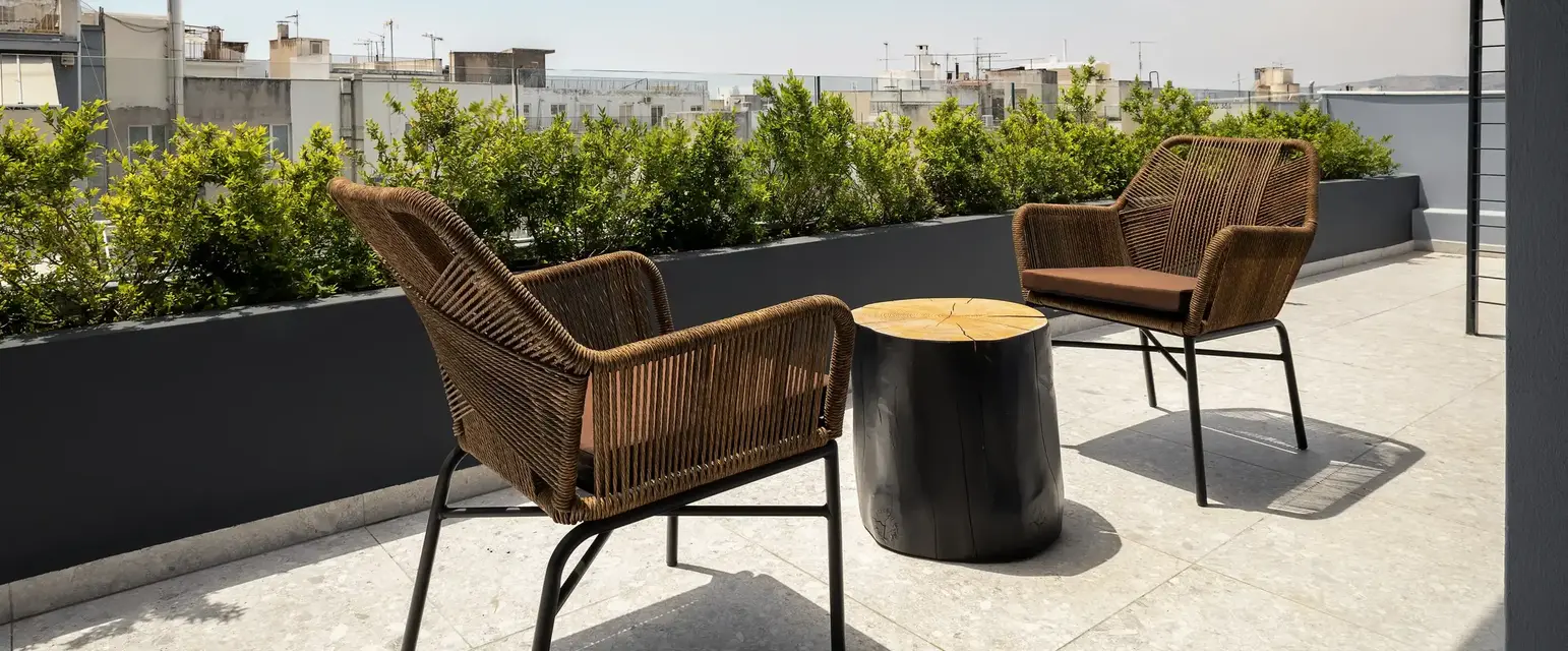 a group of chairs on a patio