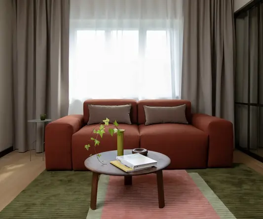 a living room with a couch and a coffee table