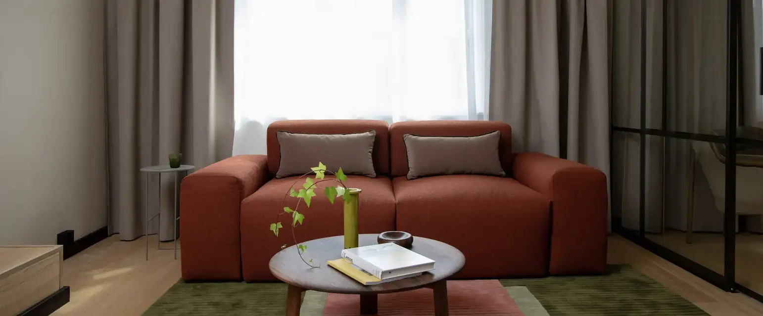 a living room with a couch and a coffee table