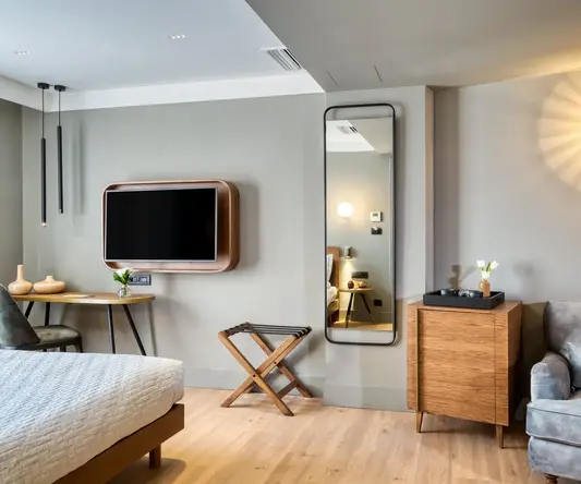 a room with a tv and a couch