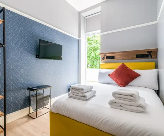 a bed with towels on it