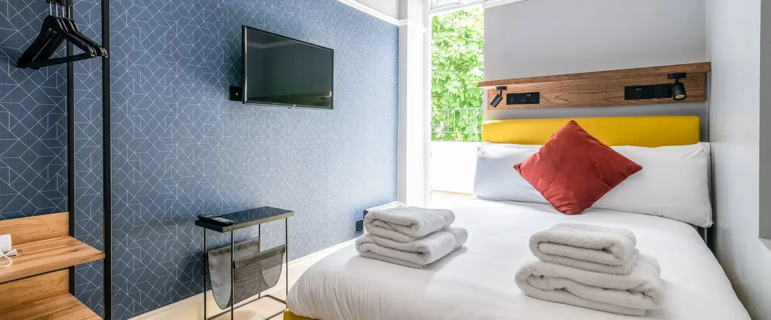 a bed with towels on it