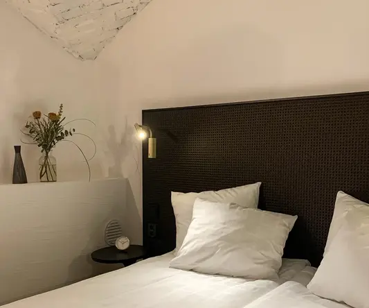 a bed with a blanket on it