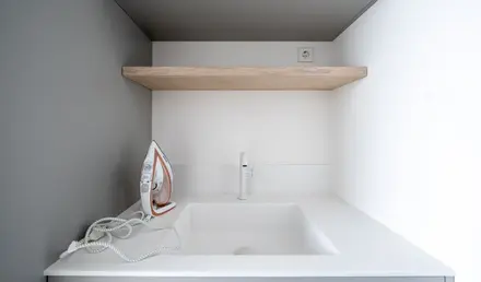a iron on a sink