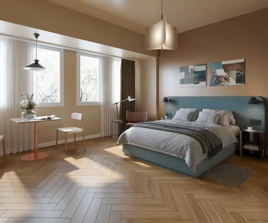 a bedroom with a bed and a desk
