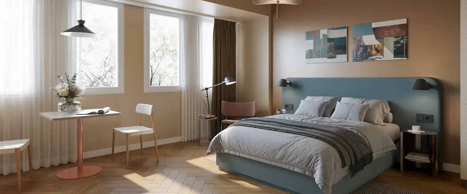 a bedroom with a bed and a desk