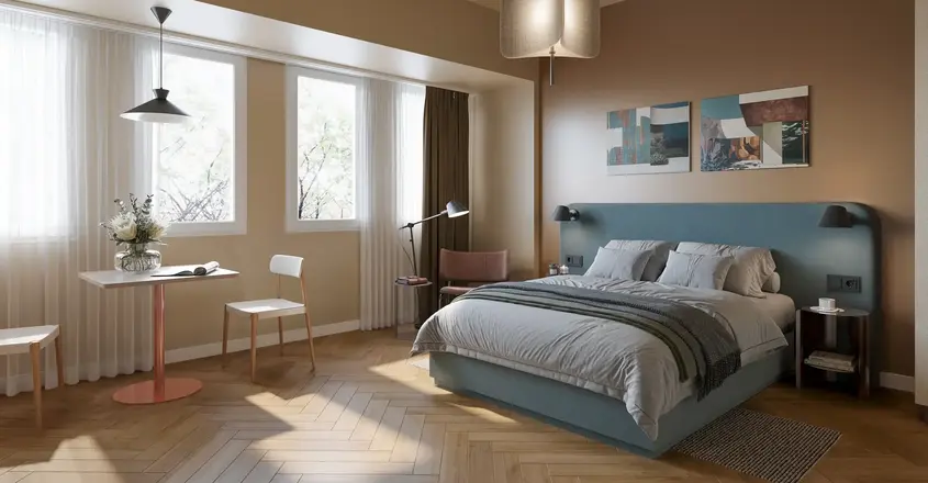 a bedroom with a bed and a desk