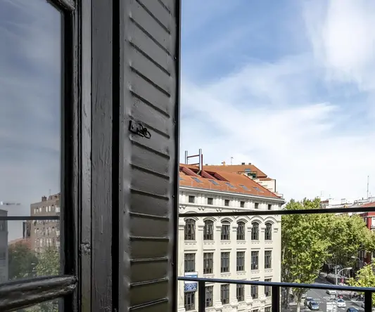 a view of a city from a balcony