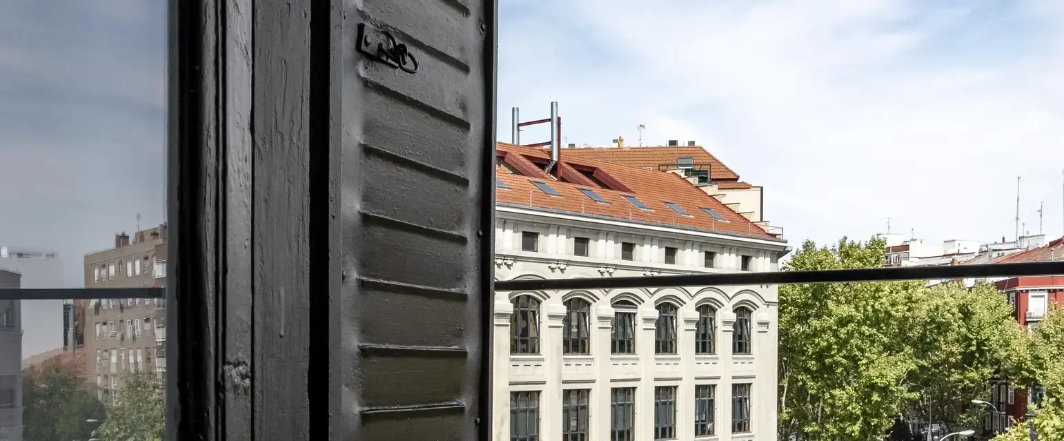 a view of a city from a balcony