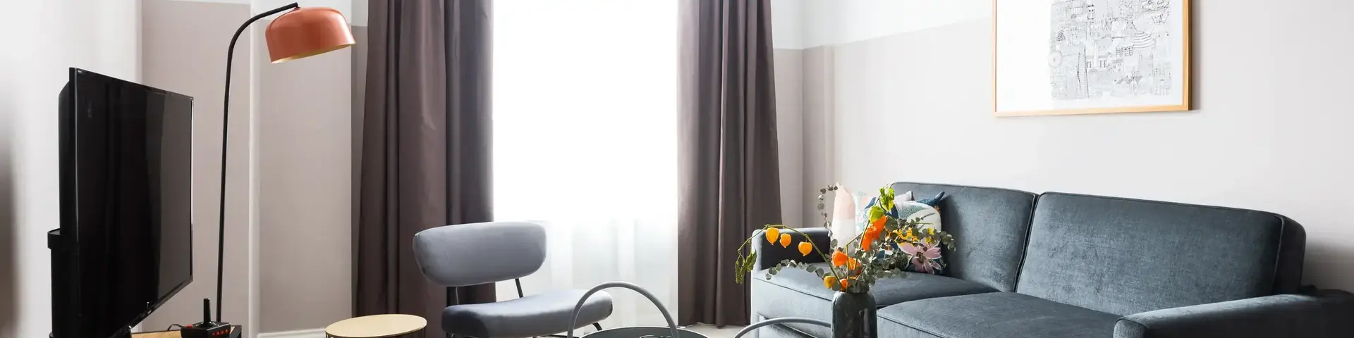 a living room with a couch and a table