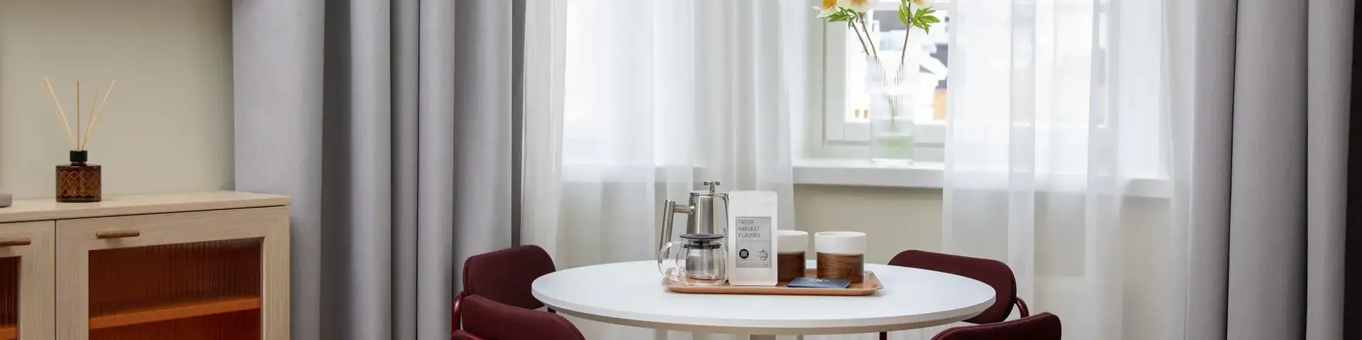 a table with chairs in a room