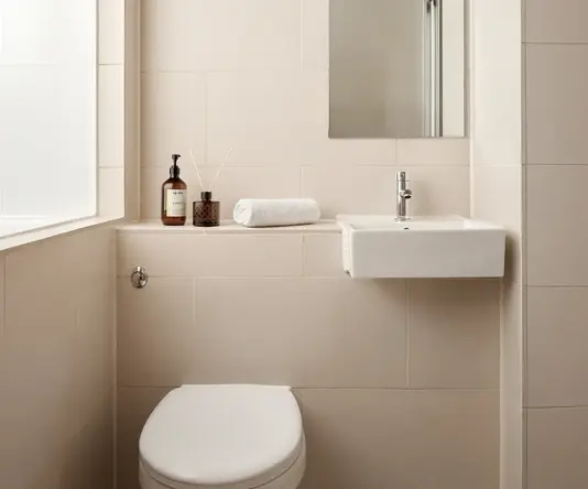 a bathroom with a sink and toilet
