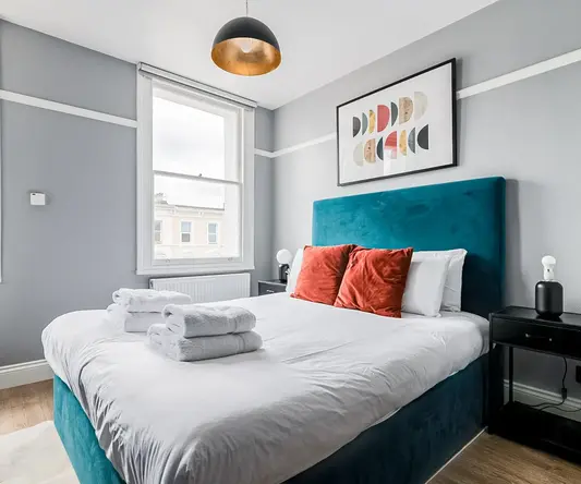 a bed with towels on it