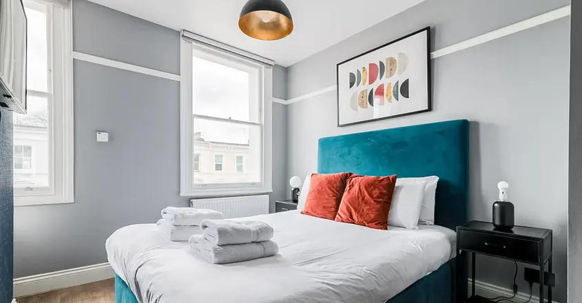 a bed with towels on it