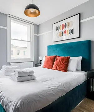 a bed with towels on it