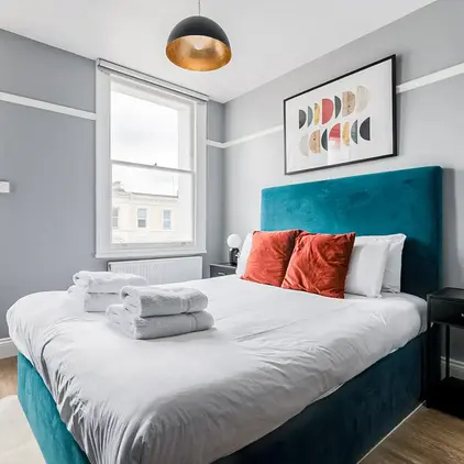 a bed with towels on it