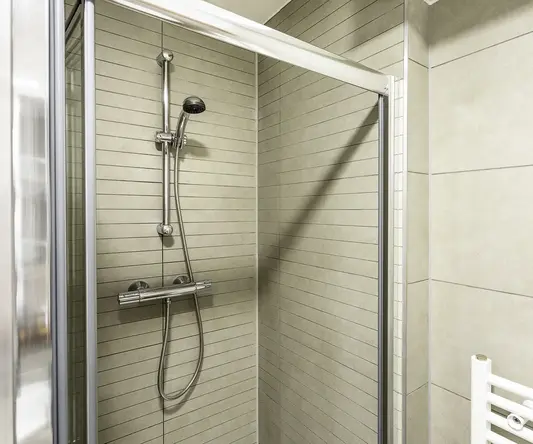 a shower with a shower head