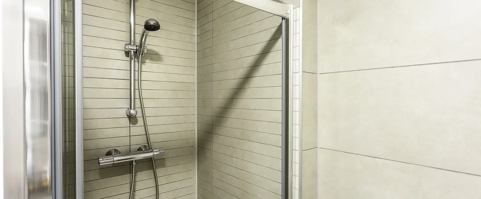 a shower with a shower head