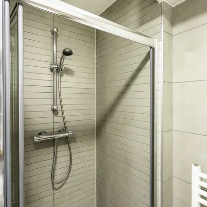 a shower with a shower head